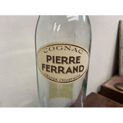 228 - A VINTAGE PIERRE FERRAND COGNAC DISPENSER ON STAND, three litre bottle with original labels, central... 