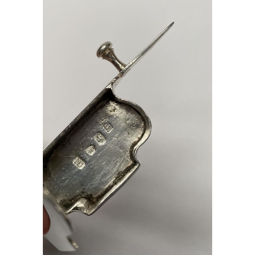 23 - A GEORGE III SILVER CANDLE SNUFFER, Maker John Booth, London, 1767. With oval handles and attached r... 