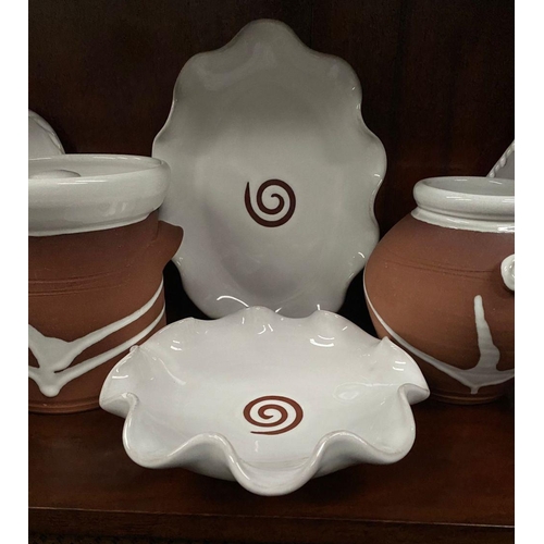 231 - A LARGE COLLECTION OF STEPHEN PEARCE IRISH POTTERY, to include four shaped plates, two bowls, three ... 