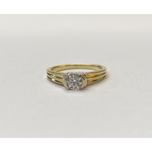 28 - A BEAUTIFUL 18CT TWO TONE GOLD DIAMOND SOLITAIRE RING, round brilliant cut diamond, in ornate half b... 