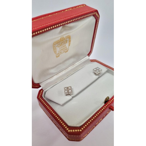 31 - A GEORGEOUS CASED PAIR OF CARTIER DIAMOND CLUSTER STUD EARRINGS, each with four brilliant cut diamon... 