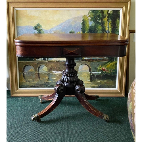 34 - A REGENCY MAHOGANY FOLD-OVER TEA TABLE, with raised carving and beading to the frieze above turned a... 