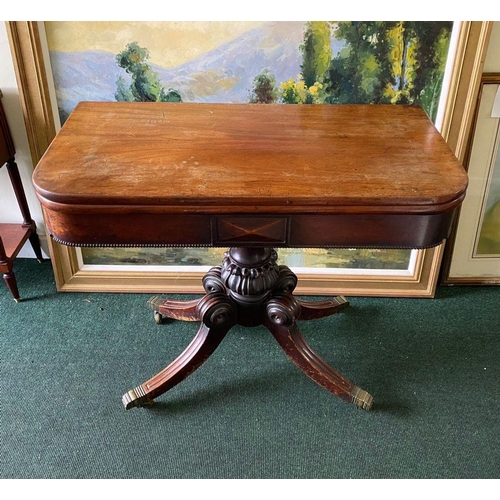 34 - A REGENCY MAHOGANY FOLD-OVER TEA TABLE, with raised carving and beading to the frieze above turned a... 