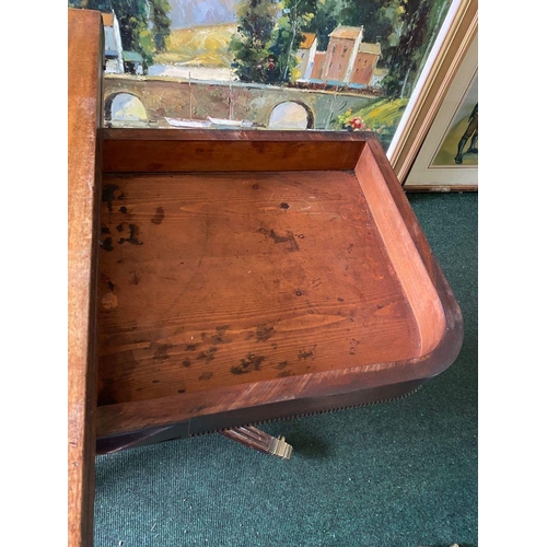 34 - A REGENCY MAHOGANY FOLD-OVER TEA TABLE, with raised carving and beading to the frieze above turned a... 