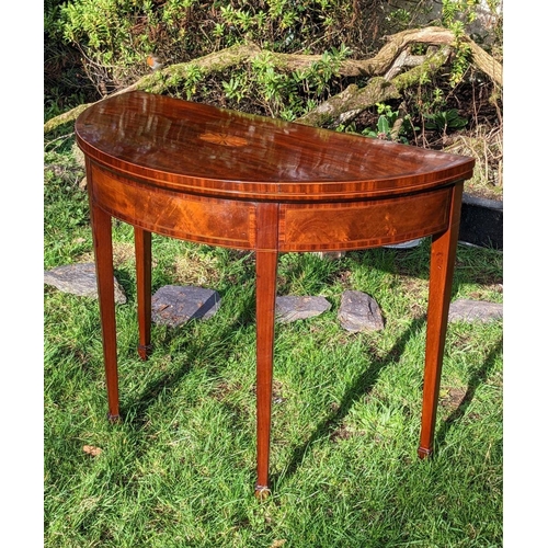 4 - AN EXCELLENT GEORGE III MAHOGANY DEMI LUNE CARD TABLE, having crossbanded top with marquetry fan dec... 