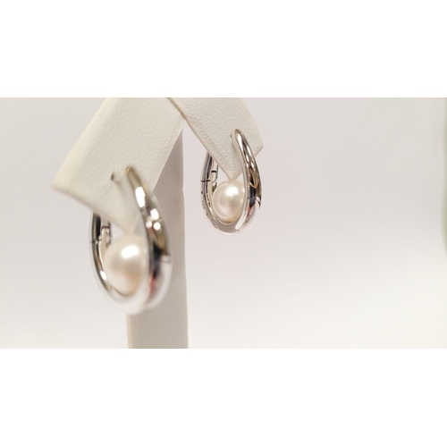 41 - A CLASSIC PAIR OF MIKIMOTO CULTURED PEARL & WHITE GOLD LOOP EARRINGS, these are a timeless design, w... 