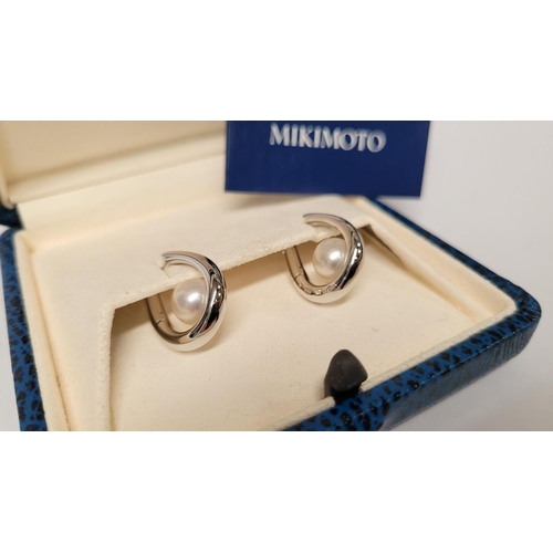 41 - A CLASSIC PAIR OF MIKIMOTO CULTURED PEARL & WHITE GOLD LOOP EARRINGS, these are a timeless design, w... 