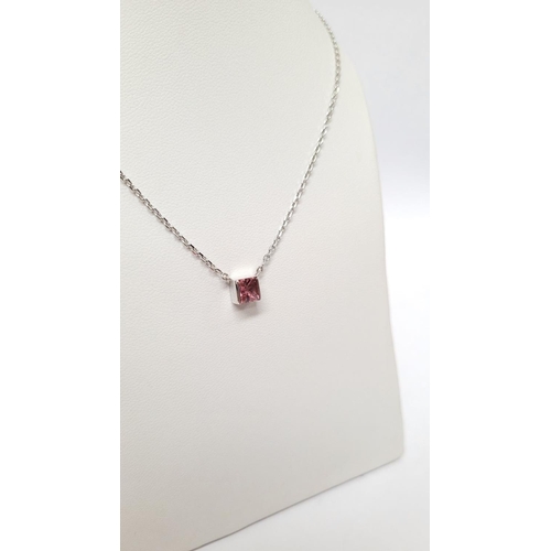 45 - A VERY PRETTY CARTIER TANK PENDANT NECKLACE IN 18CT WHITE GOLD WITH A PINK TOURMALINE STONE, marked ... 