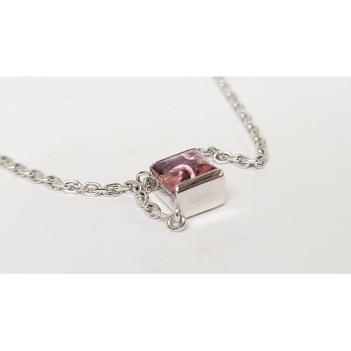 45 - A VERY PRETTY CARTIER TANK PENDANT NECKLACE IN 18CT WHITE GOLD WITH A PINK TOURMALINE STONE, marked ... 