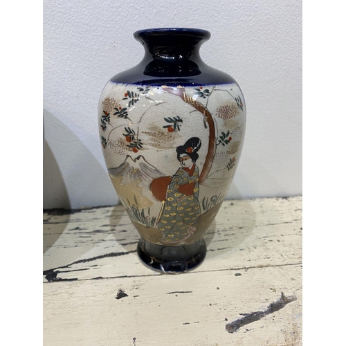 47 - THREE GRADUATED 20TH CENTURY SATSUMA VASES, each with gilded decoration on painted panels depicting ... 