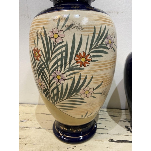 47 - THREE GRADUATED 20TH CENTURY SATSUMA VASES, each with gilded decoration on painted panels depicting ... 