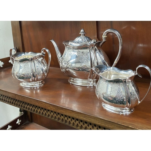 5 - AN SUBSTANTIAL GEORGE V SILVER TEA SERVICE, to include teapot, sugar bowl and milk jug, Maker Atkin ... 