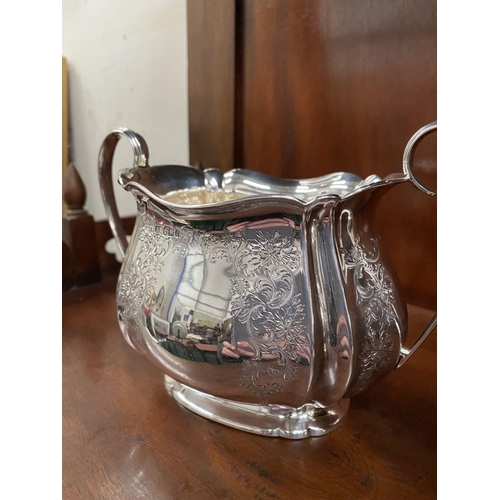 5 - AN SUBSTANTIAL GEORGE V SILVER TEA SERVICE, to include teapot, sugar bowl and milk jug, Maker Atkin ... 