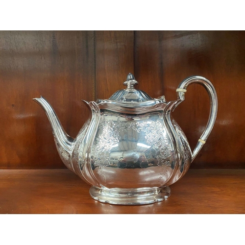 5 - AN SUBSTANTIAL GEORGE V SILVER TEA SERVICE, to include teapot, sugar bowl and milk jug, Maker Atkin ... 