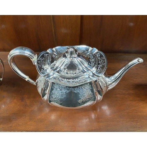 5 - AN SUBSTANTIAL GEORGE V SILVER TEA SERVICE, to include teapot, sugar bowl and milk jug, Maker Atkin ... 