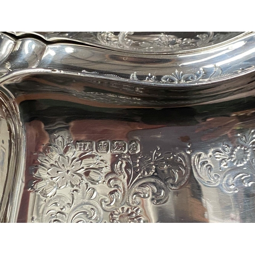 5 - AN SUBSTANTIAL GEORGE V SILVER TEA SERVICE, to include teapot, sugar bowl and milk jug, Maker Atkin ... 