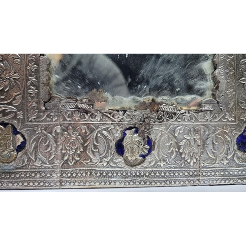 58 - A SILVER & ENAMEL FRAMED MIRROR, clad to the front & back with silver decorated with elaborate scene... 