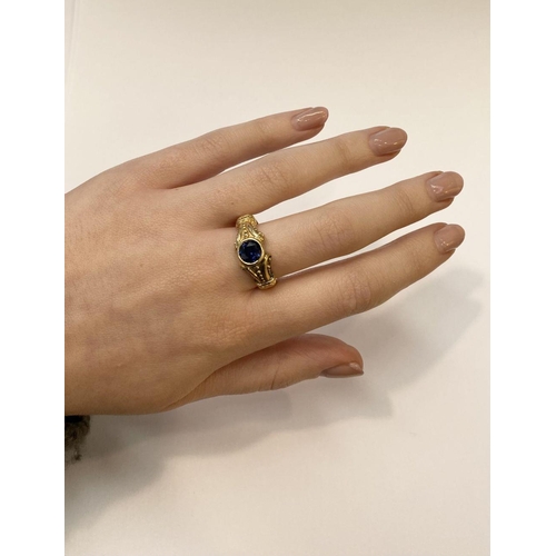 59 - A 14CT YELLOW GOLD ART NOUVEAU STYLE SAPPHIRE RING, Maker Adwar Casting, with the round brilliant cu... 