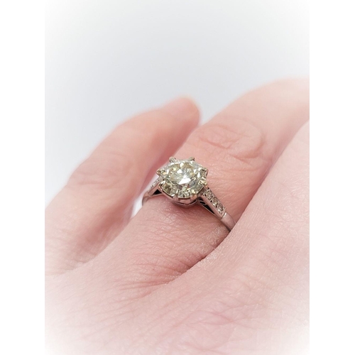 64 - A LOVELY SOLITAIRE DIAMOND RING, a perfect gift for the one you love! The central raised crown set d... 