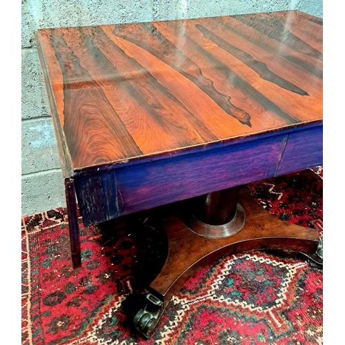 70 - A WILLIAM IV ROSEWOOD DROP-LEAF SOFA TABLE, 1810, base terminating in quadro-pod, standing on scroll... 