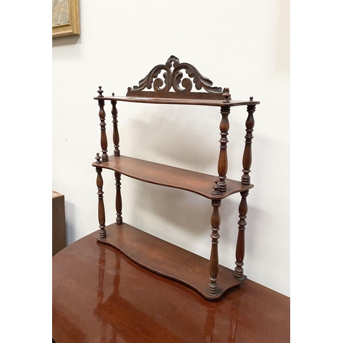 72 - A FLORAL VICTORIAN THREE-TIER MAHOGANY SPINDLE HANGING SHELF,  acanthus carving to the top, with spi... 