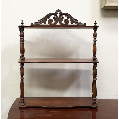 72 - A FLORAL VICTORIAN THREE-TIER MAHOGANY SPINDLE HANGING SHELF,  acanthus carving to the top, with spi... 