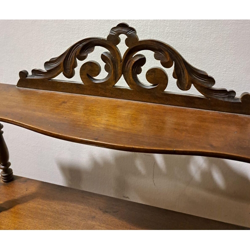 72 - A FLORAL VICTORIAN THREE-TIER MAHOGANY SPINDLE HANGING SHELF,  acanthus carving to the top, with spi... 