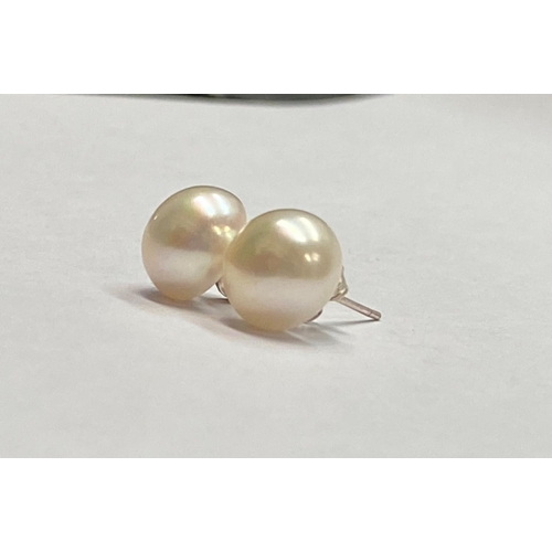 74 - A PAIR OF PEARL STUD EARRINGS, with silver backs, marked 925