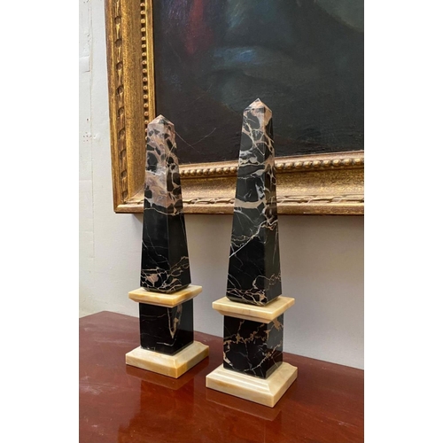 9 - AN EXCELLENT PAIR OF MID 20TH CENTURY MARBLE OBELISKS, body with tapered form, in black Portoro ripp... 