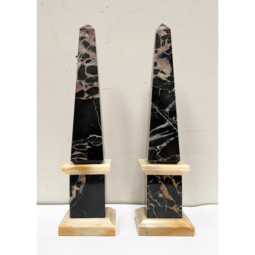 9 - AN EXCELLENT PAIR OF MID 20TH CENTURY MARBLE OBELISKS, body with tapered form, in black Portoro ripp... 