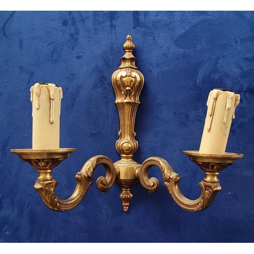 102 - A SET OF FOUR FRENCH LOUIS XV STYLE WALL SCONCES, early 20th century, each with a pair of light fitt... 