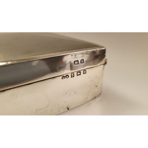 105 - A GOOD QUALITY SILVER COVERED CIGAR BOX, with hinged lid and lined with wood. The top is decorated w... 