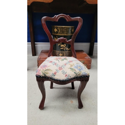 111 - A MINIATURE VINTAGE CARVED DINING CHAIR, with balloon shaped back, stuffed over seat with bead detai... 