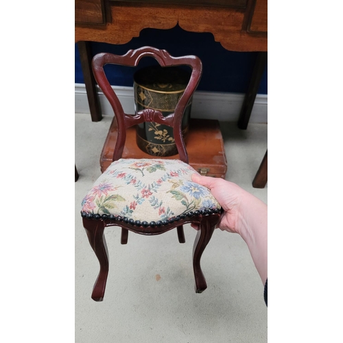 111 - A MINIATURE VINTAGE CARVED DINING CHAIR, with balloon shaped back, stuffed over seat with bead detai... 