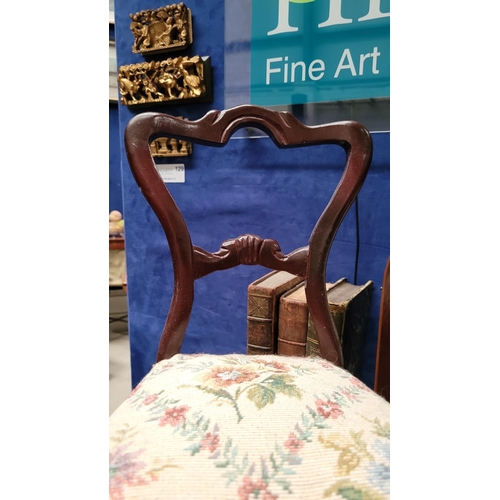 111 - A MINIATURE VINTAGE CARVED DINING CHAIR, with balloon shaped back, stuffed over seat with bead detai... 