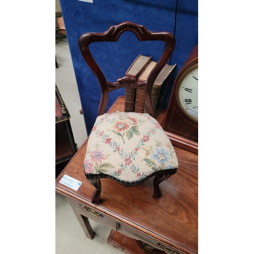 111 - A MINIATURE VINTAGE CARVED DINING CHAIR, with balloon shaped back, stuffed over seat with bead detai... 