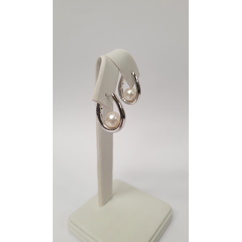 113 - A CLASSIC PAIR OF MIKIMOTO CULTURED PEARL & WHITE GOLD LOOP EARRINGS, these are a timeless design, w... 