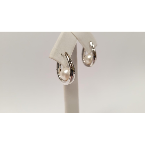 113 - A CLASSIC PAIR OF MIKIMOTO CULTURED PEARL & WHITE GOLD LOOP EARRINGS, these are a timeless design, w... 