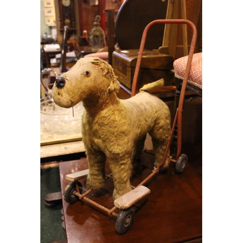 115 - AN EARLY 20TH CENTURY TOY DOG - PEDIGREE SOFT TOY LTD, made in Northern Ireland, with label beneath,... 