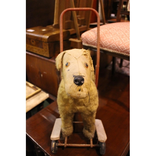 115 - AN EARLY 20TH CENTURY TOY DOG - PEDIGREE SOFT TOY LTD, made in Northern Ireland, with label beneath,... 