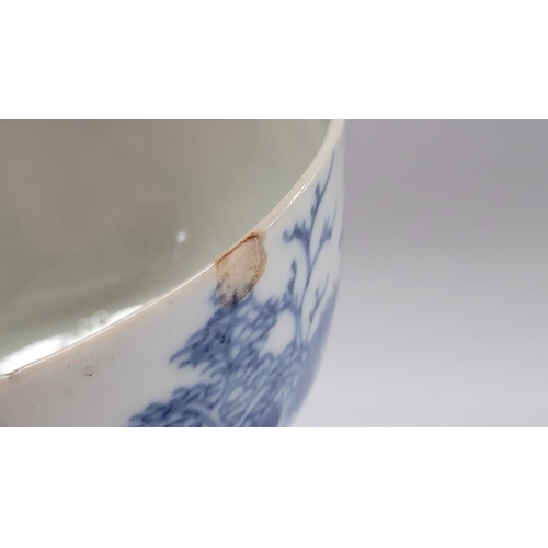 116 - A CHINESE BLUE & WHITE PORCELAINE TEA BOWL & SAUCER, late 18th century / early 19th century, decorat... 