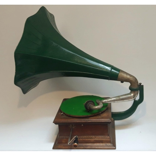 121 - A VINTAGE IRISH GRAMAPHONE, with original painted tin horn, a Dublin trade label attached. Measures ... 