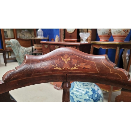 124 - AN EDWARDIAN MAHOGANY INLAID CORNER CHAIR, with raised crest rail decorated with marquetry inlay of ... 