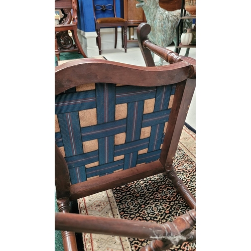 124 - AN EDWARDIAN MAHOGANY INLAID CORNER CHAIR, with raised crest rail decorated with marquetry inlay of ... 