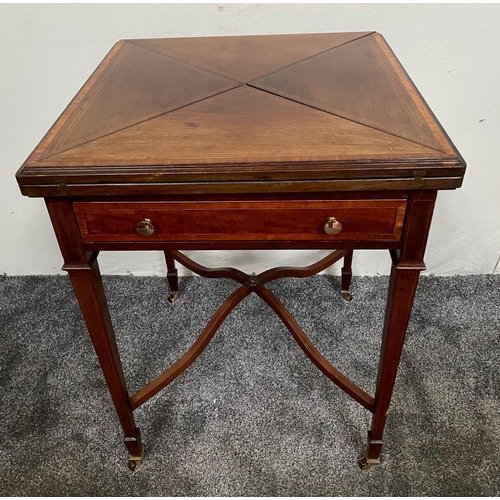 153 - AN EDWARDIAN INLAID FOLDING OUT ENVELOPE CARD / GAMES TABLE, the top is divided into four triangular... 