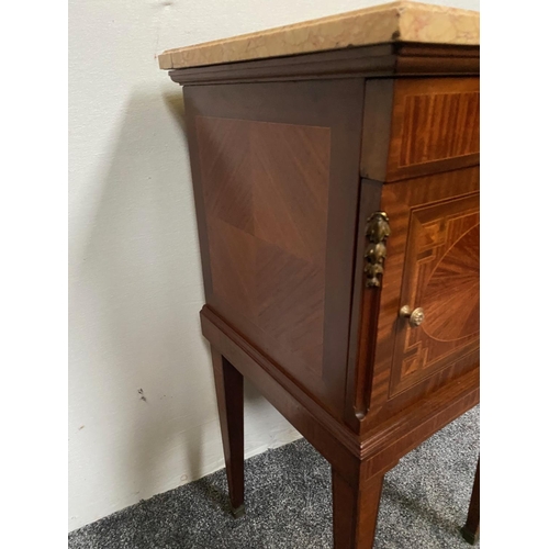 157 - A VERY GOOD QUALITY MIXED WOOD MARBLE TOPPED CABINET with a single drawer over a cabinet; the door d... 