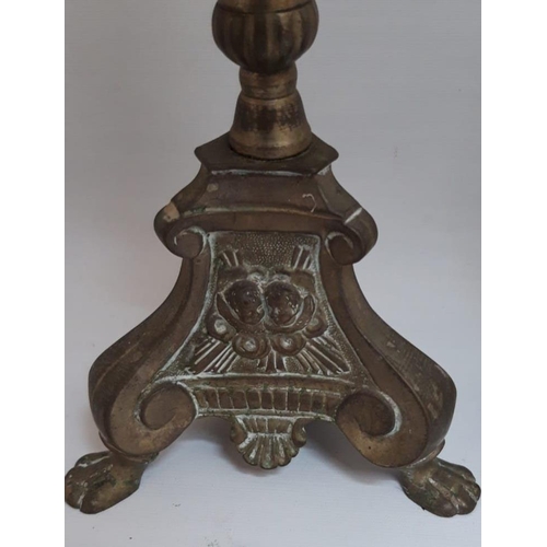 170 - A GOOD QUALITY PAIR OF LARGE GOTHIC STULS BRASS CANDLESTICKS, each base with paw feet and angel or c... 