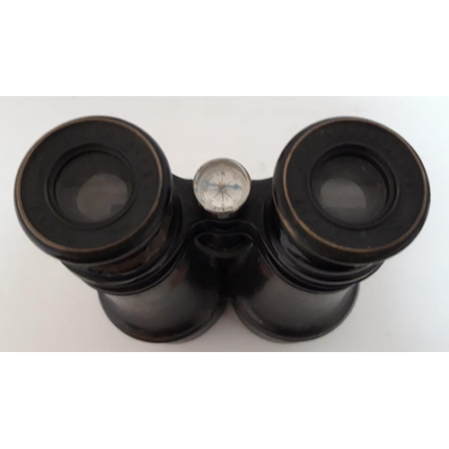 174 - A CASED FRENCH BINOCULARS, in leather case with integrated compass, circa 1900. Stamped Sans Rivale,... 