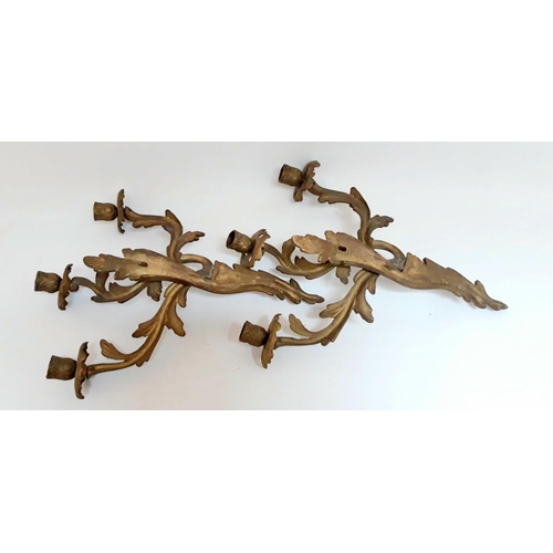 178 - A PAIR OF ANTIQUE BRASS WALL CANDLEABRA, each with scrolling foliage design, 34cm at widest, 40cm ta... 