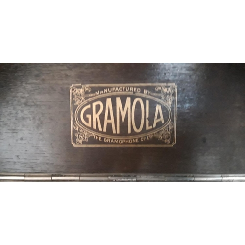 180 - A VINTAGE TABLE GRAMAPHONE BY GRAMOLO, nice domed lid and double doors to the front, all for restora... 